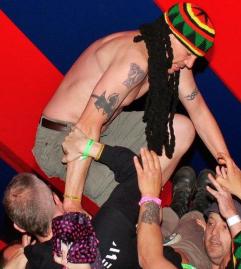 Dean clambers up on to a surfboard comprising of yours truly!